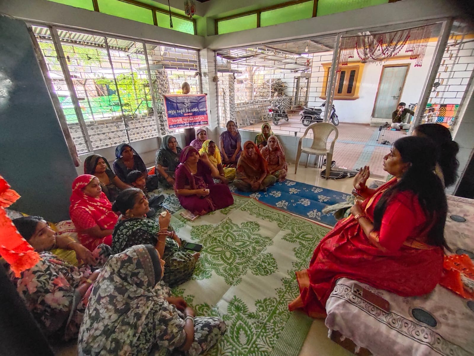 Outreach meeting with village families