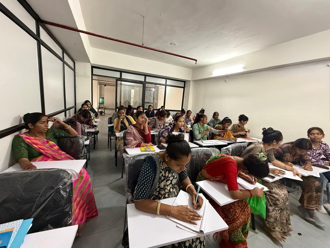 Classroom group of women learning together