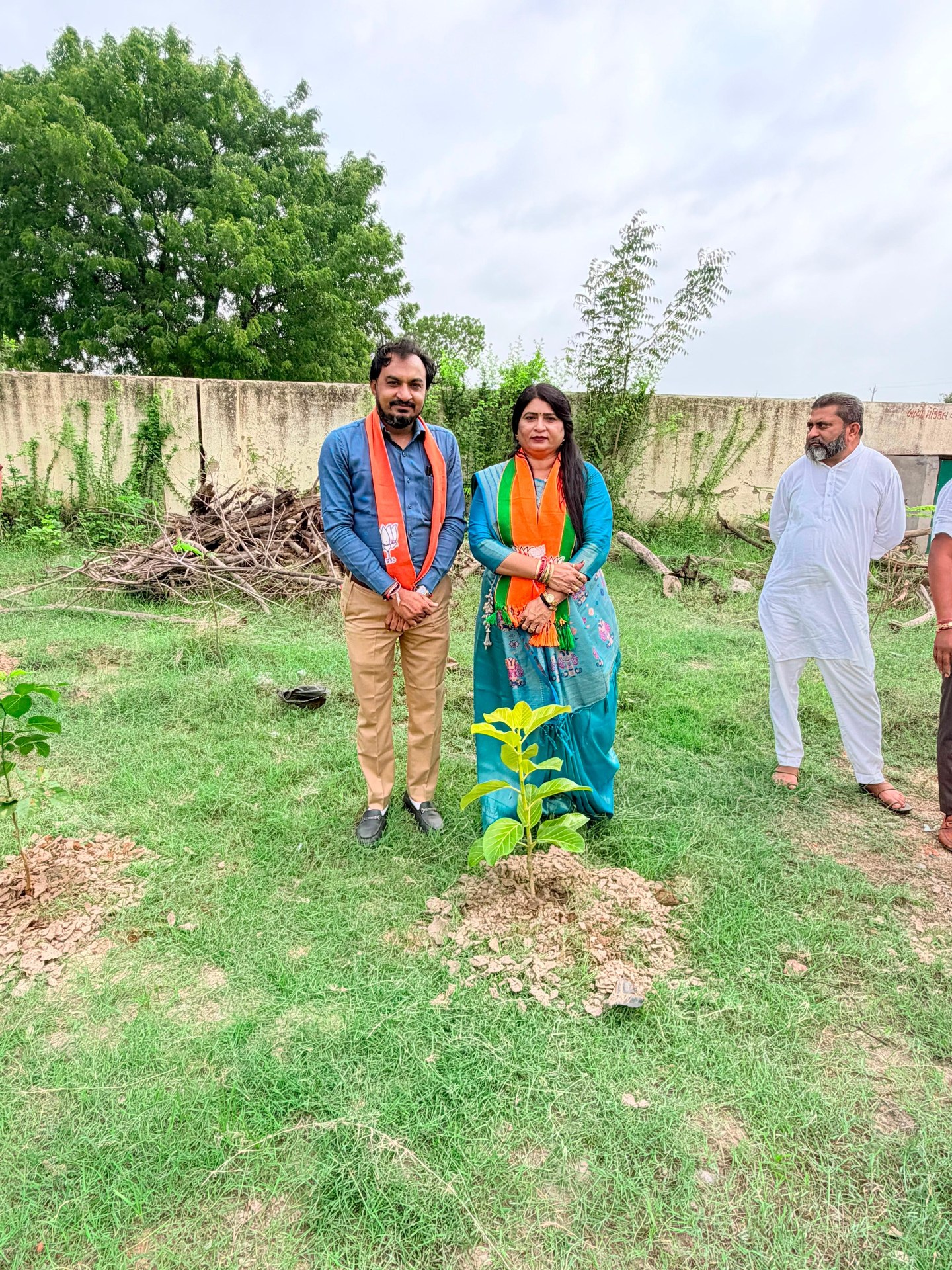 Village plantation drive with local youth